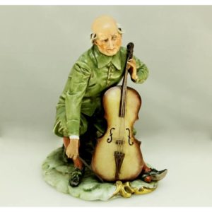 Statuetta suonatore con violoncello - porcellana KING'S